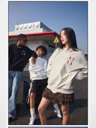 MEDM Oversized Logo Crewneck Sweatshirt in Beige