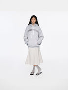 RARELY ALIKE Living Offline Embroidered Fleece Hoodie in Gray - On Model