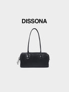 DISSONA Vegetable Tanned Leather Baguette Bag in Black