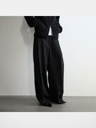 RandomPiece Single Pleat Merino Wool Trousers in Black - On Model