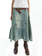 NeverSeez Asymmetric Vintage Wash Denim Skirt in Blue - On Model