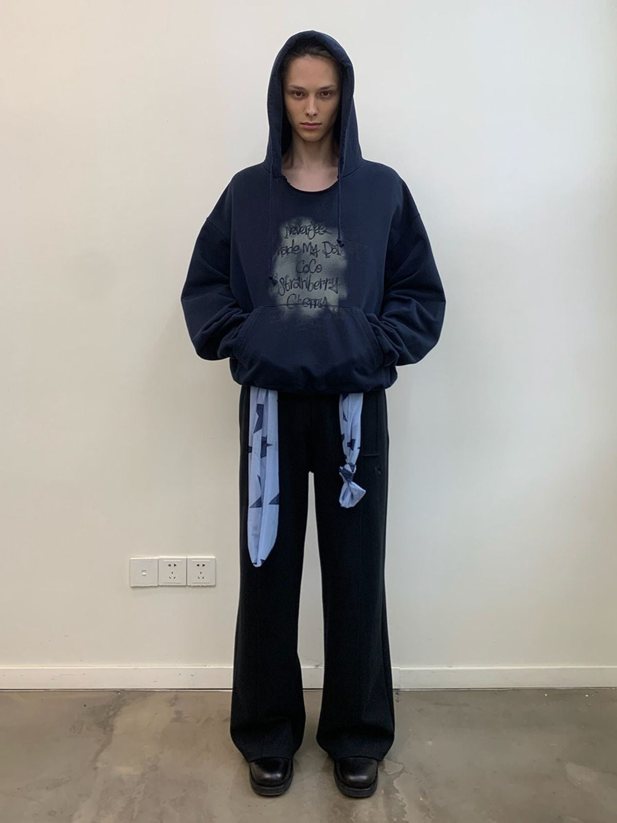 NeverSeez Mist Spray Paint Distressed Hoodie in Navy - On Male Model