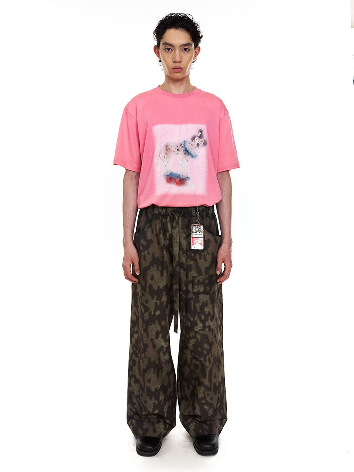 NeverSeez Hazy Puppy Print Cotton T Shirt in Pink - On Male Model