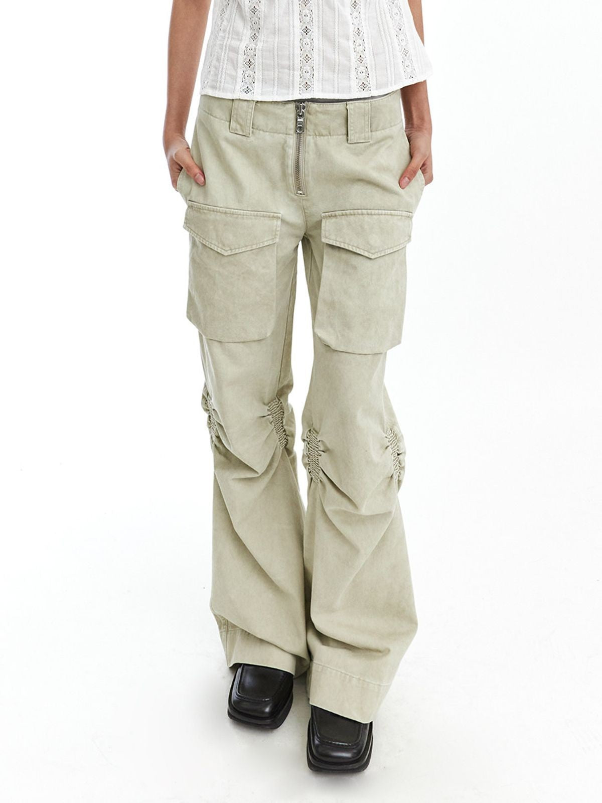 NeverSeez Distressed Micro Flare Cargo Pants in Green - On Model
