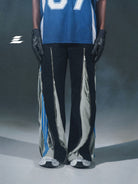 LOSTCTRL Deconstructed Zip Split Pants in Black - On Model