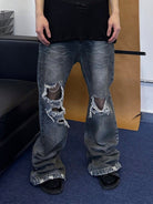 TRIANGLE PROJECT Distressed Dirty Wash Micro Flare Jeans in Denim - On Model