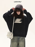 LOSTCTRL Abstract Logo Knit Sweater in Black - On Model