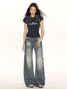 BIGGOLD STUDIO Washed High Waist Wide Leg Jeans in Blue - On Model #color_blue