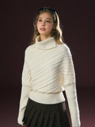 Ariseism Diagonal Cable High Neck Sweater in White - On Model
