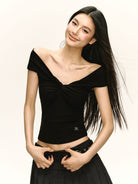 Ariseism Twisted Off Shoulder Top in Black - On Model