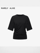 RARELY ALIKE Asymmetrical Ruched Waist Tee in Black