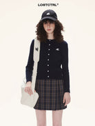 LOSTCTRL Cropped Cable Knit Cotton Cardigan in Blue - On Model