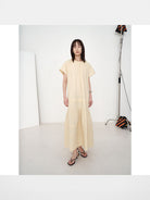 RandomPiece Eco Cotton Hemp Tiered Maxi Dress in Cream - On Model