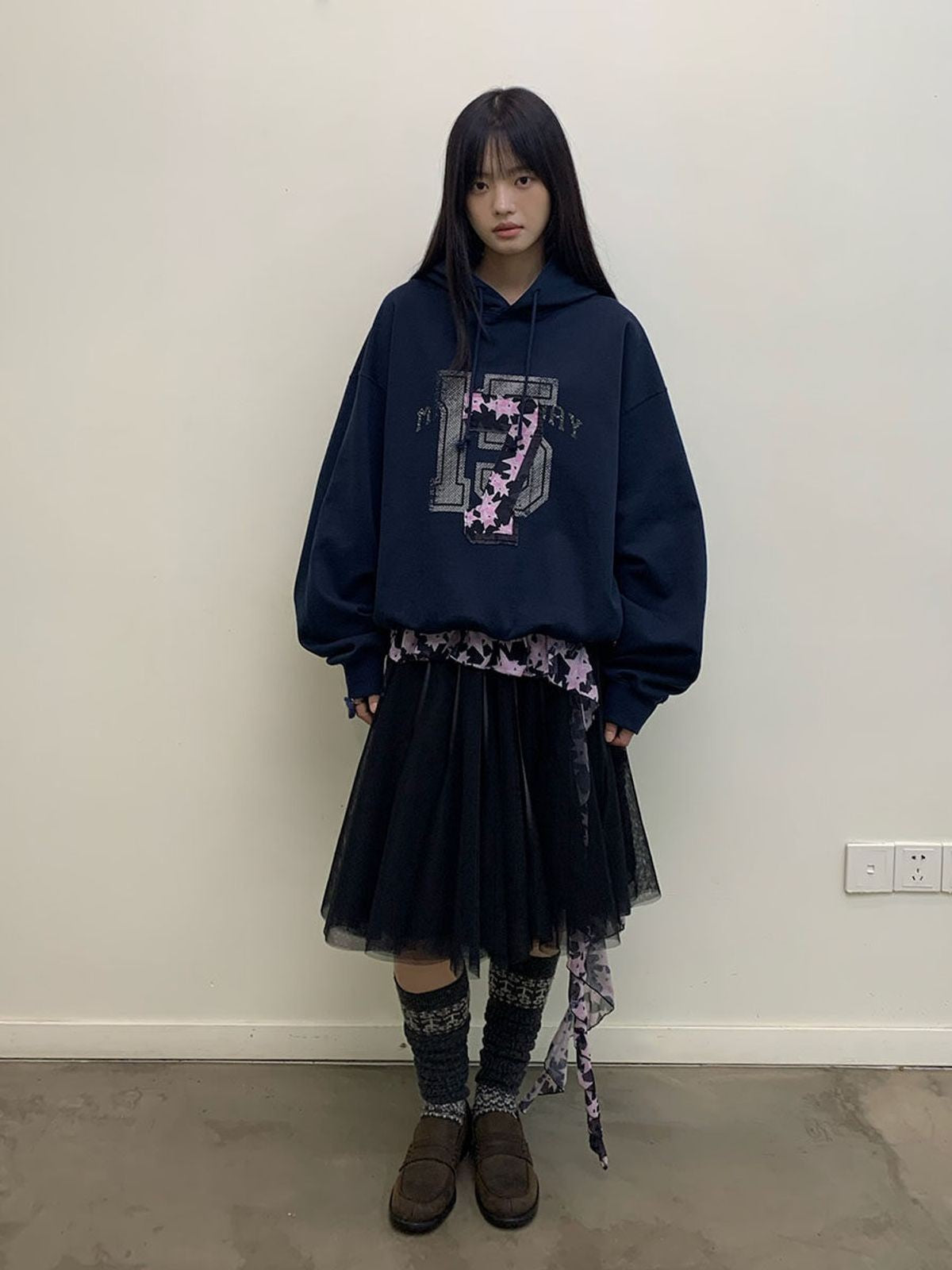 NeverSeez Layered Graphic Patch Hoodie in Navy - On Female Model