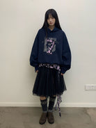 NeverSeez Layered Graphic Patch Hoodie in Navy - On Female Model