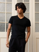 Retro 21 Anti Wrinkle V Neck T Shirt in Black - On Model