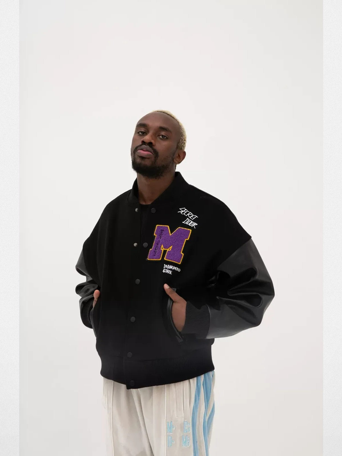 MEDM Wool Blend Varsity Jacket in Black - On Model