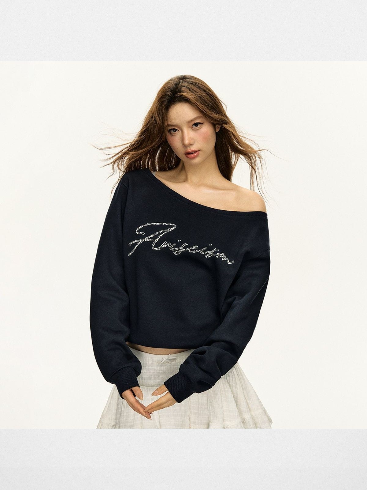 Ariseism Asymmetric Off Shoulder Rhinestone Sweatshirt in Navy Blue - On Model