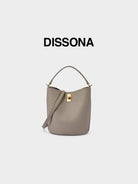 DISSONA Cowhide Leather Bucket Bag in Beige