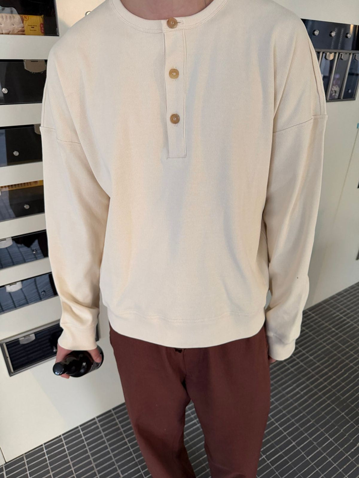 TRIANGLE PROJECT Ribbed Cotton Henley Sweatshirt in White - On Model