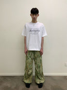 NeverSeez Love Flower Shop Embroidered Tee in White - On Male Model