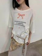 NeverSeez Snake Bow Print T Shirt in White - On Model