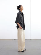 Randompiece Matte PU Leather Short Sleeve Shirt Jacket in Black - On Model