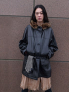RandomPiece Wool Lined Distressed PU Coat in Black - On Female Model