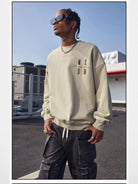 MEDM Cotton Blend Logo Crewneck in Beige - On Male Model