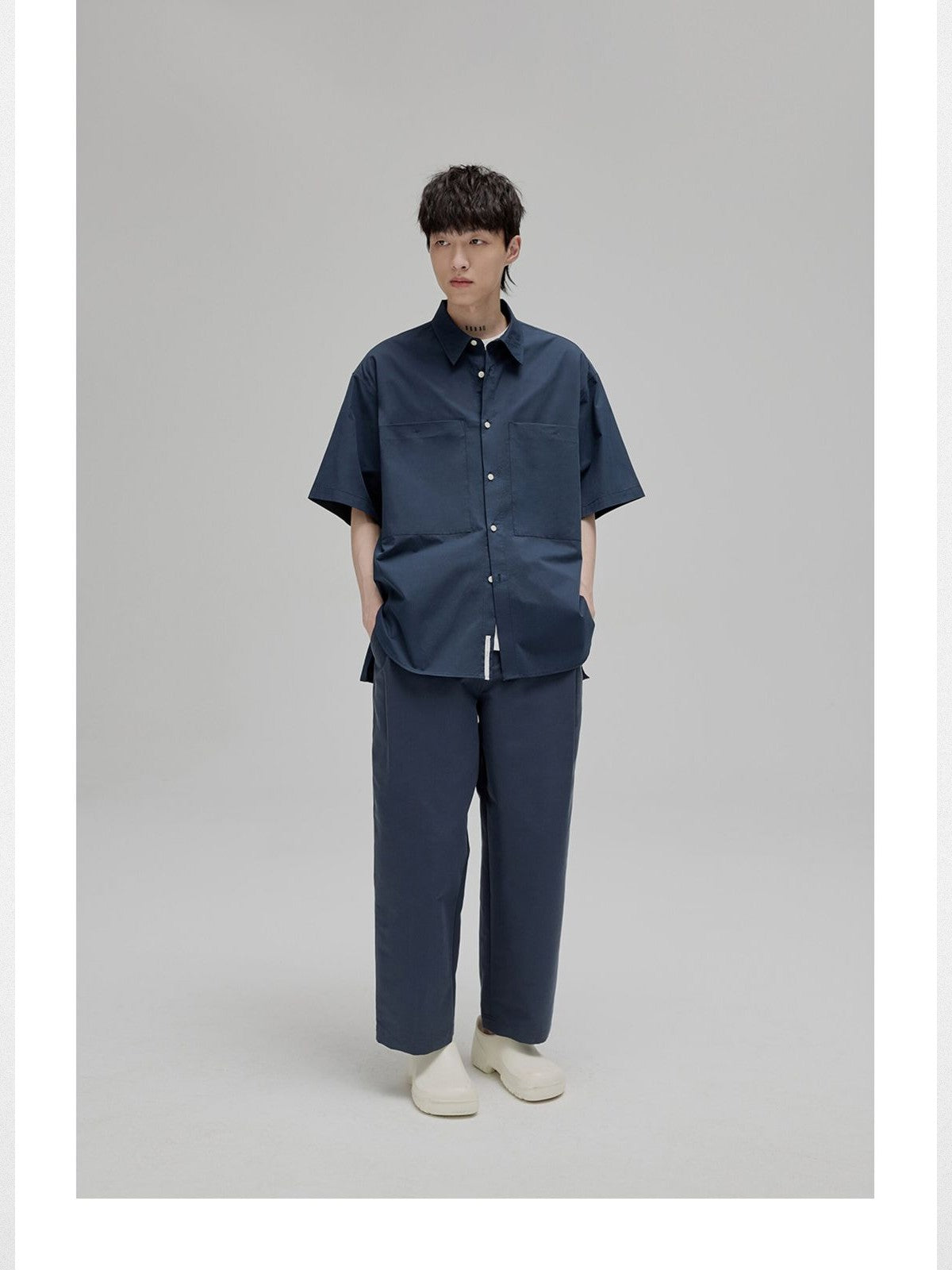 NANS Sand Washed Cotton Curved Hem Shirt in Navy Blue - On Model