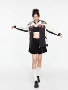 PUKI Embroidered PU Leather Racing Jacket in Black - On Model
