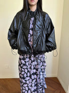 NeverSeez Glossy Ruched Tencel Windbreaker in Black - On Female Model