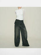 Amee Asymmetrical Waist Wide Leg Jeans in Black - On Model