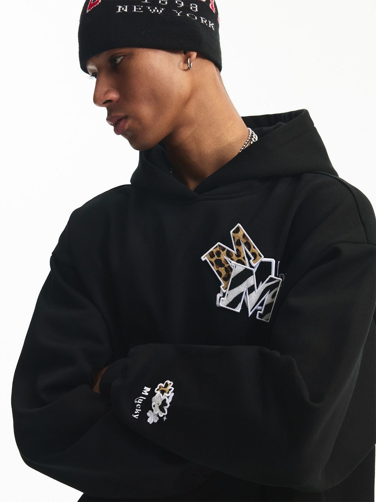 MEDM Pony Hair Patch Fleece Hoodie in Black - On Male Model