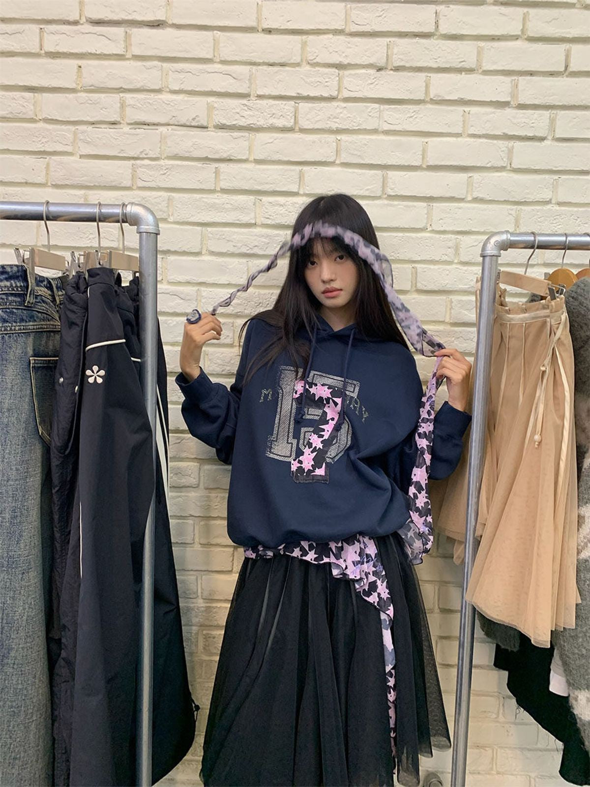 NeverSeez Layered Graphic Patch Hoodie in Navy - On Female Model