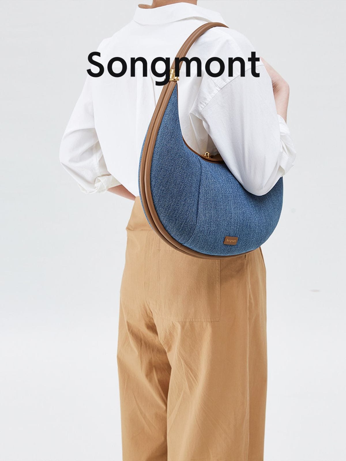 Songmont Denim Leather Crescent Bag in Blue - On Model