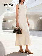 FION Monogram Canvas Crossbody Pillow Bag in Brown - On Female Model