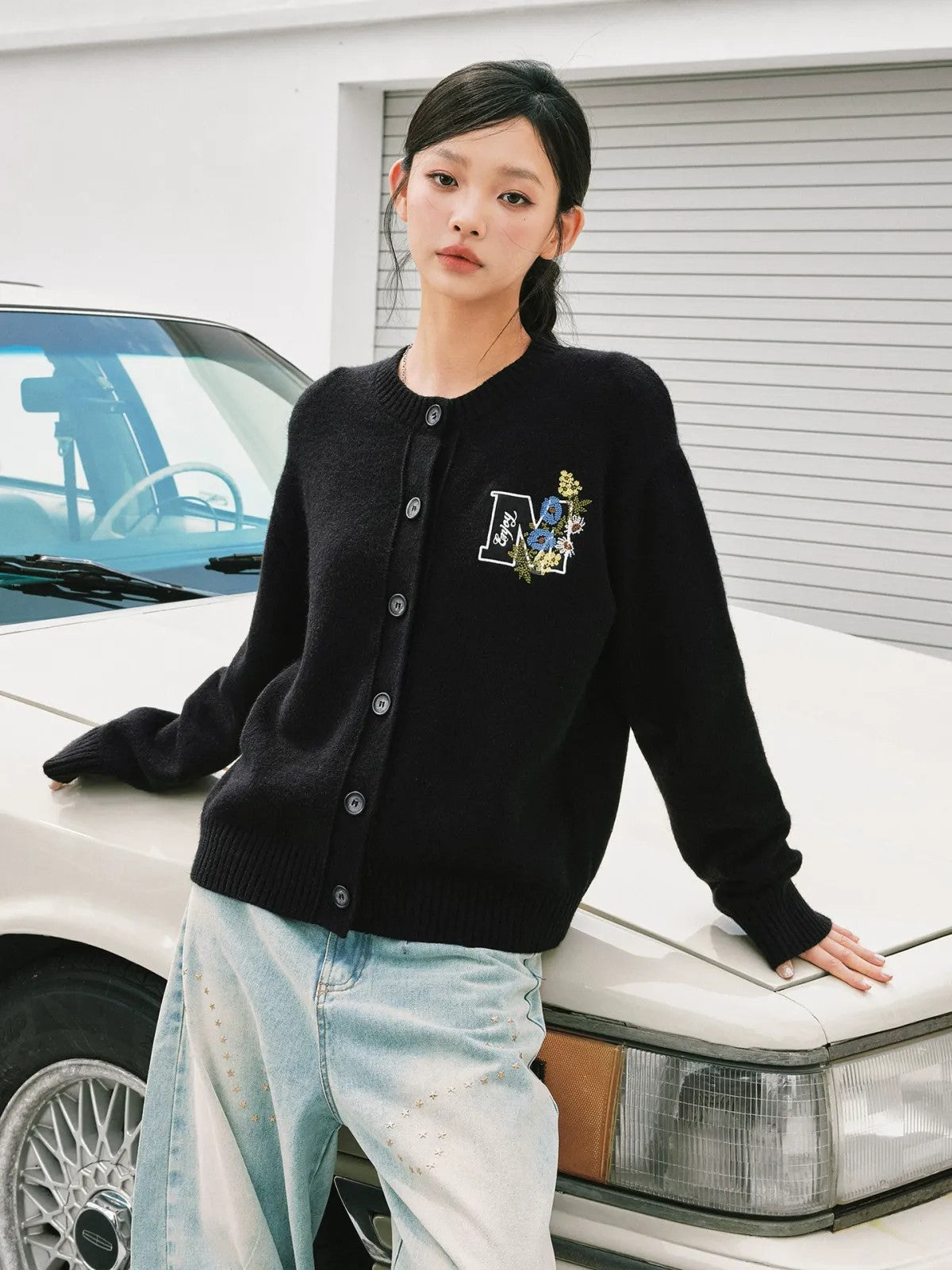 MEDM Floral Embroidered Knit Cardigan in Black - On Female Model