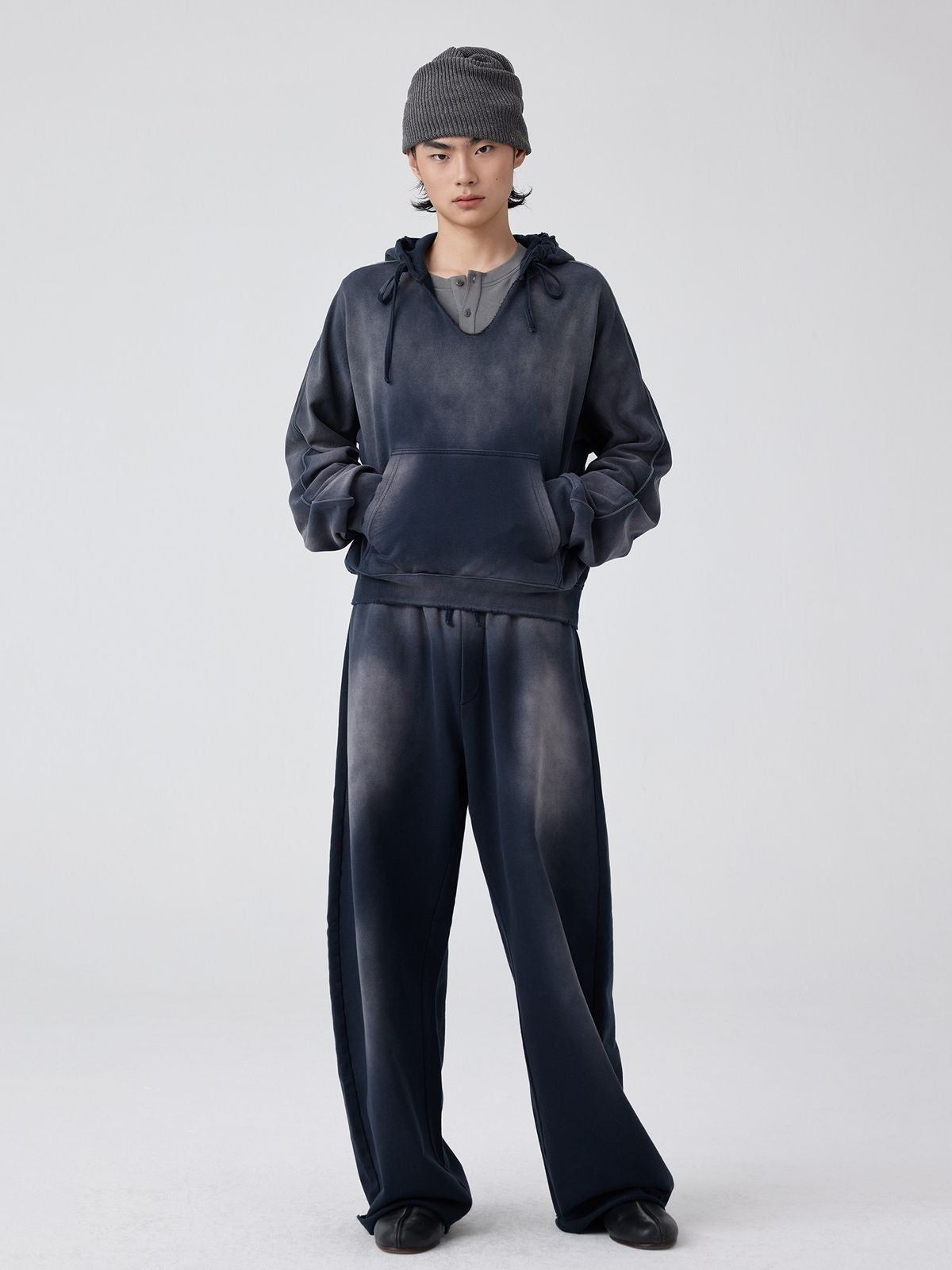 Simple Project Distressed Painted V Neck Hoodie in Navy - On Model