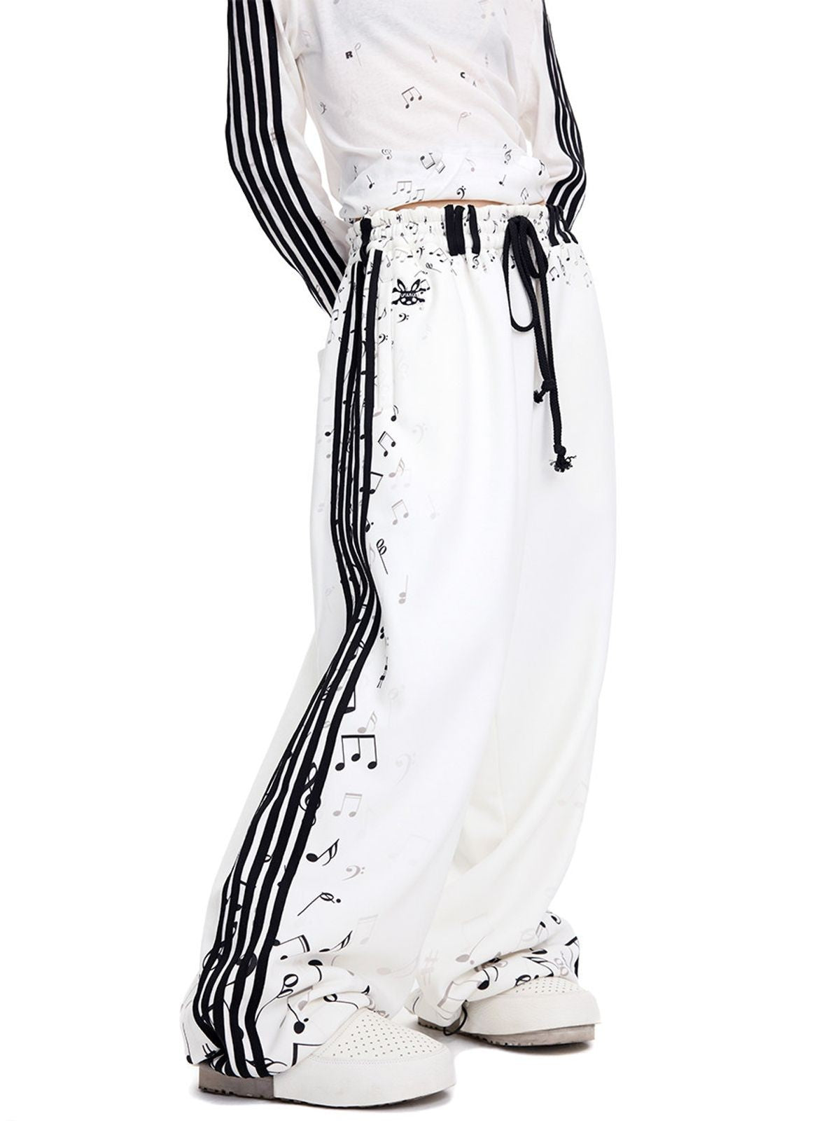 CFIERCE Musical Staff Print Sweatpants in White - On Female Model