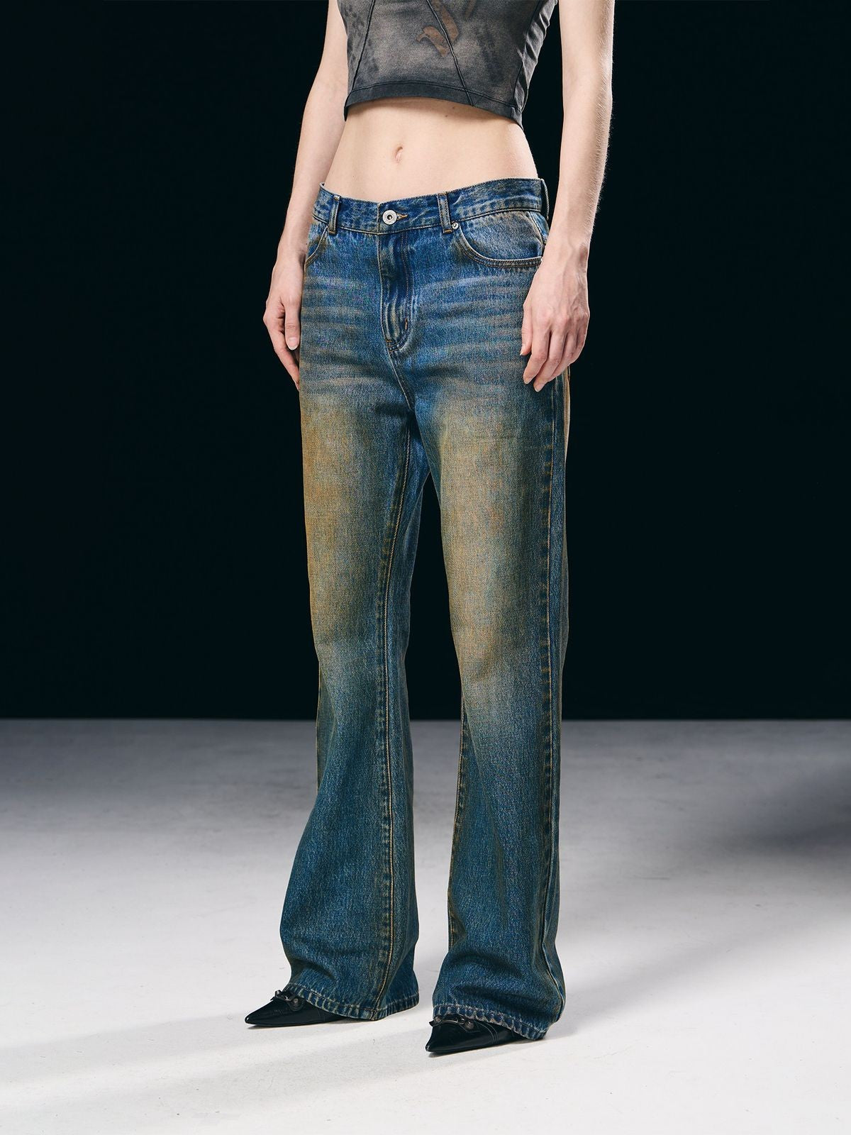 BLINDNOPLAN Mud Washed Distressed Micro Flare Jeans in Blue - On Model