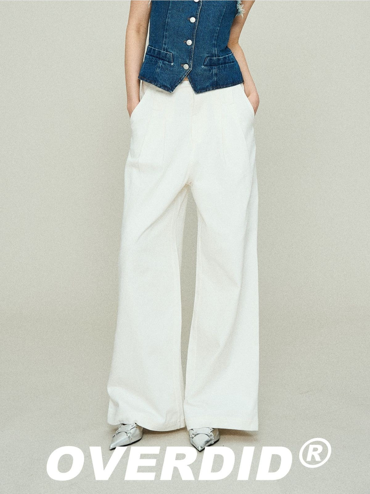 Amee Pleated Cotton Wide Leg Trousers in White - On Model