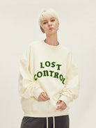 LOSTCTRL Chenille Logo Crewneck Sweatshirt in Cream - On Model