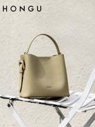 HONGU Split Cowhide Bucket Bag in Beige - Lifestyle
