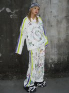 CFIERCE Graffiti Print Wide Leg Sweatpants in White - On Model