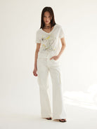 THELIGHT OFFICIAL Distressed Graphic V Neck T Shirt in White - On Model