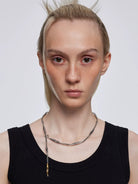 BLACKHEAD Two Tone Lightning Bolt Necklace in Gray - On Female Model