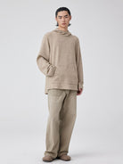 Simple Project Pom Pom Detail Hoodie in Beige - On Male Model