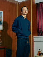 SOD Embroidered Padded Shoulder Hoodie in Blue - On Model