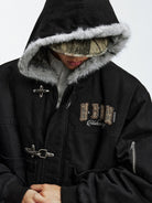 MEDM Canvas Padded Jacket with Buckles in Black - On Male Model